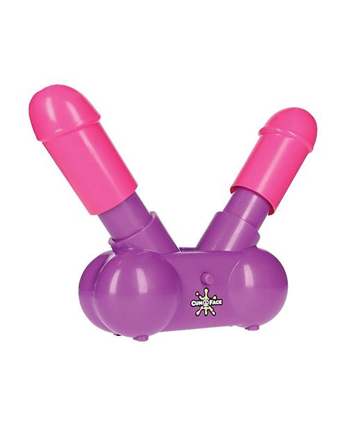 The Cum Face Game up against a white background. The base of the game is purple, and it has two pink "penises" protruding at a 45-degree angle. The pink penises can be pumped up and down on the plastic purple base. | Kinkly Shop