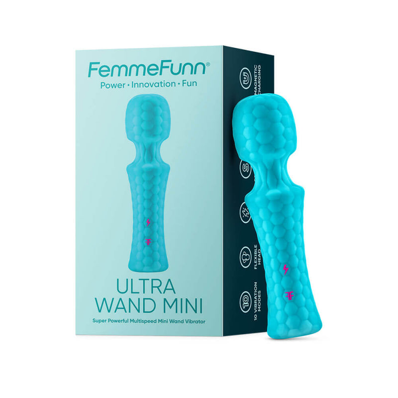 The FemmeFunn Ultra Wand Mini leans up against the packaging that it arrives in. The box is color-matched to your vibe's color with a rectangular, sturdy cardboard. | Kinkly Shop