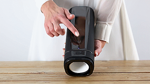 GIF shows a person holding the KIIROO Onyx+ in one hand. In their other hand, they're using their finger on the touch pad panel to increase the intensity. The angle allows us to see the Onyx+ responding with faster movement as the person increases the intensity. | Kinkly Shop