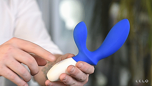 GIF shows a person holding the LELO LOKI Wave. The toy is on with the come hither shaft moving back and forth. | Kinkly Shop