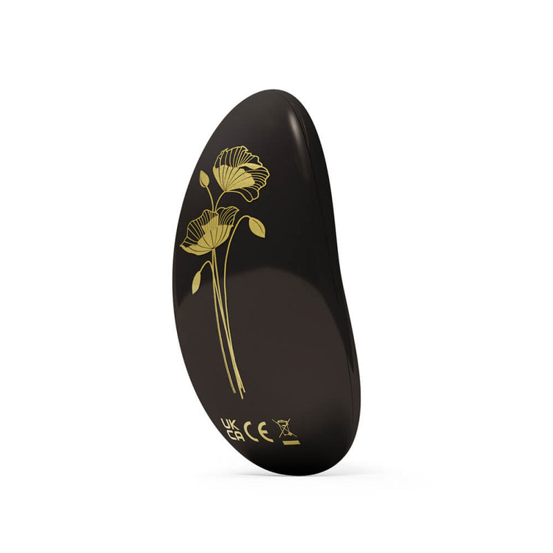 Backside of the LELO NEA 3 in Pitch Black. There are beautiful floral engravings in a gold on the backside of the vibe. | Kinkly Shop