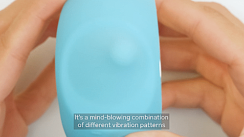 GIF showcases the "tongue" of the LELO Ora 3 in action, showing how it swirls around within the thin silicone layer to simulate oral sex. The "tongue" swirls back and forth, side to side, and a full 360-degree circle. The text on the bottom of the GIF reads "It's a mind-blowing combination of different vibration patterns". | Kinkly Shop