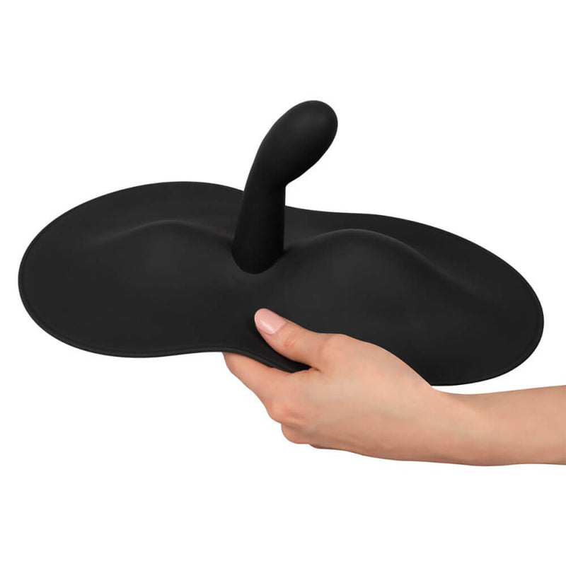 A hand holds one side of the Orion VibePad 3. The toy is surprisingly large, and it's probably the length of the person's forearm in addition to being multiple widths of the person's hand. | Kinkly Shop