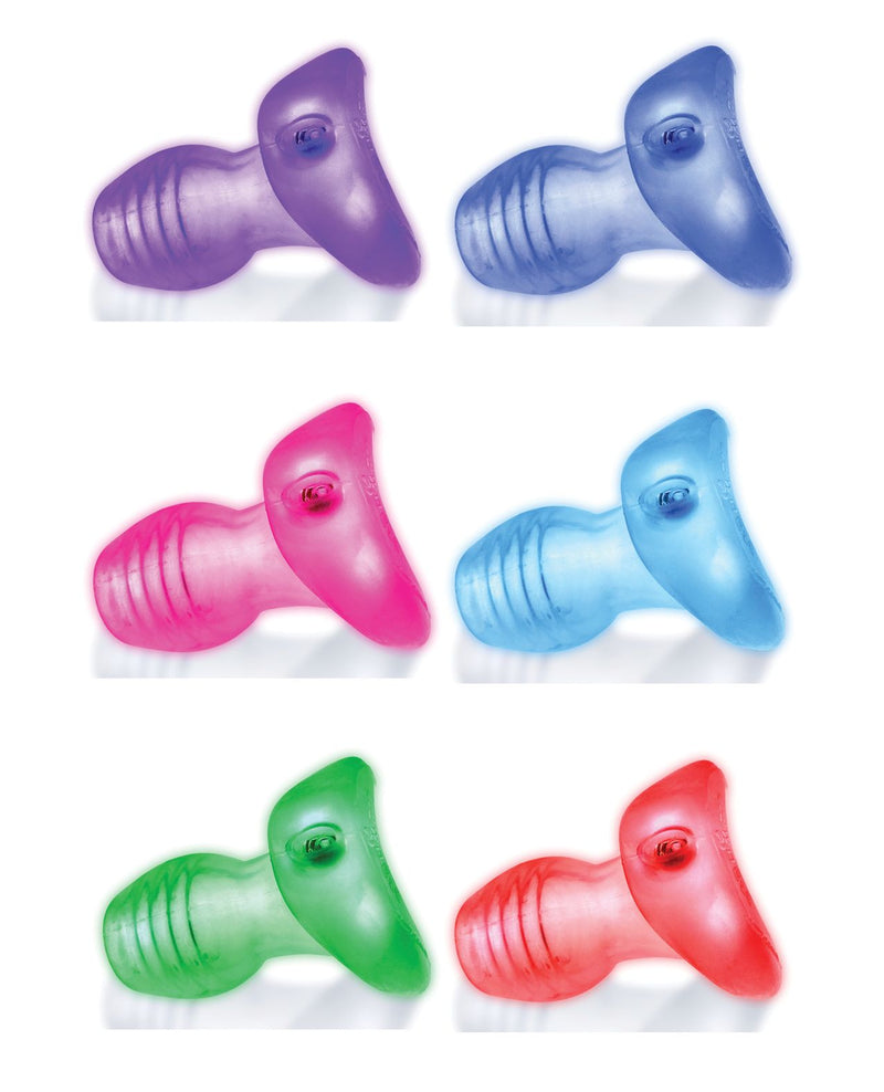 The Oxballs Glowhole shown in different colors as the included LED light scrolls through all of the different color options during wear. | Kinkly Shop