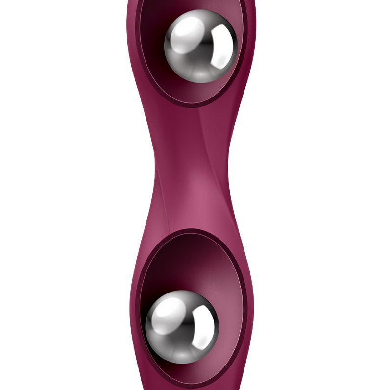 The Satisfyer Double Ball-r up against a plain white background. A see-through design uses X-Ray vision to "see through" the toy's surface to showcase the two empty, inner chambers that contain weighted balls that roll around each of the chambers. | Kinkly Shop