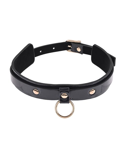 The Sportsheets Orbit Day Collar in front of a white background. It has a single O-ring on the center front, and the black material looks like it shines. | Kinkly Shop