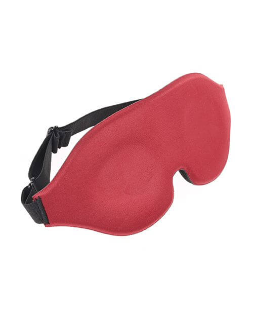 A 3/4ths view of the Sportsheets Saffron Blackout Blindfold. This image showcases the elastic band that wraps around the head, including its adjustable slider buckle that allows for complete control of the tightness of the blindfold. | Kinkly Shop