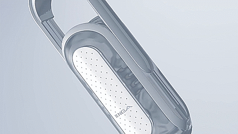 GIF showcases how the Tenga Flip Zero opens up. The side panel is slid off, the two sides are unclipped from one another, and then the Tenga Flip Zero opens up like a book to allow access to the texture within the stroker. | Kinkly Shop