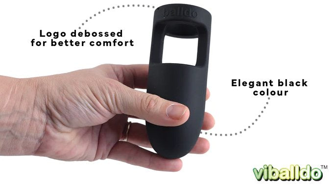 A hand holds the ViBalldo while text is shown around the toy. Text includes "Elegant black color" and "Logo debossed for better comfort" | Kinkly Shop
