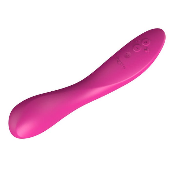 Close-up of the We-Vibe Rave 2 in Fuchsia. This angle showcases the asymmetrical shape with a broad, rounded head to snuggle up against the g-spot during use. | Kinkly Shop
