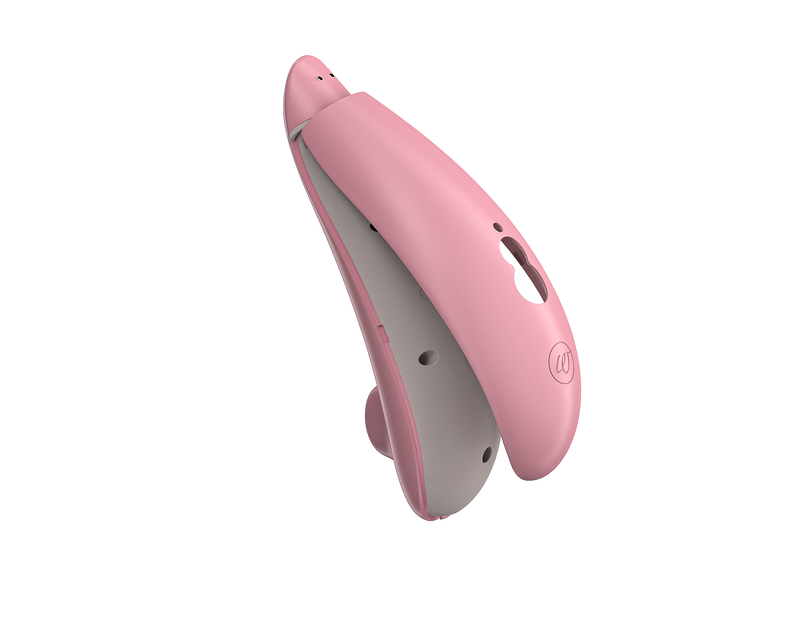 Image shows the back cover being easily removed from the Womanizer Premium Eco Friendly Vibrator. This is something this vibrator can do to make for easy replacement of the battery and easy recycling at the vibrator's end of life. | Kinkly Shop