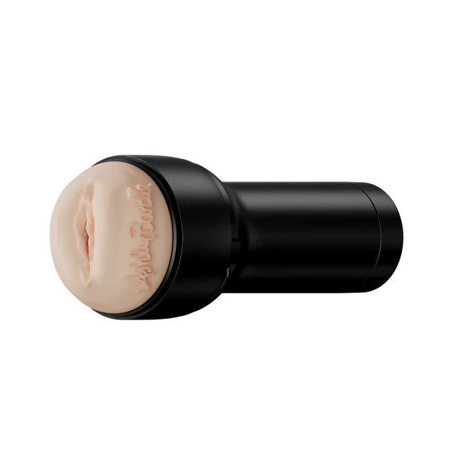 The KIIROO FeelStars FeelAshley Stroker. Ashley Barbie's signature is pressed into the stroker material itself next to the vulva orifice entrance molded after Barbie's body. | Kinkly Shop