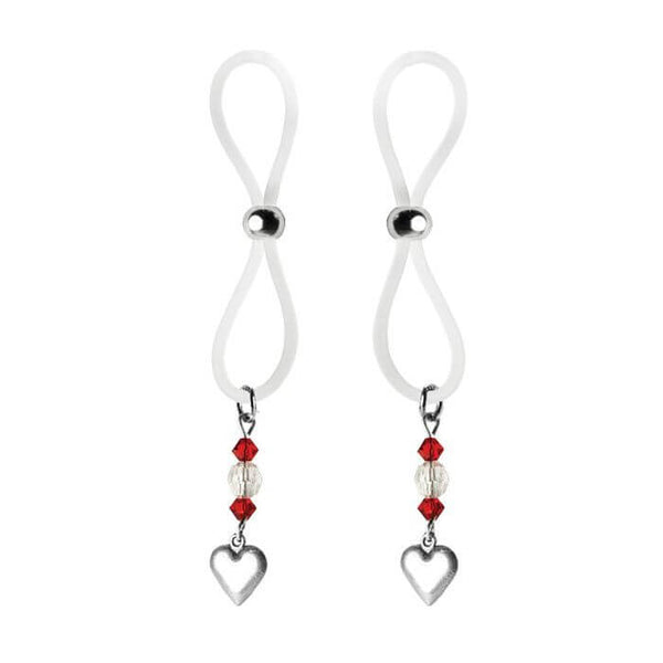 Bijoux de Nip Nipple Halos with Heart Charm. The clamps are made up of a clear "loop" with a single silver bead on each clamp that can be tightened or loosened to make the right fit. Hanging off each clamp is a set of three beads - two hexagonal, clear-ish red beads and one rounded clear-ish bead. Hanging from these three beads is a single, silver heart charm that matches the silver adjustment slider on the clamp in color. | Kinkly Shop
