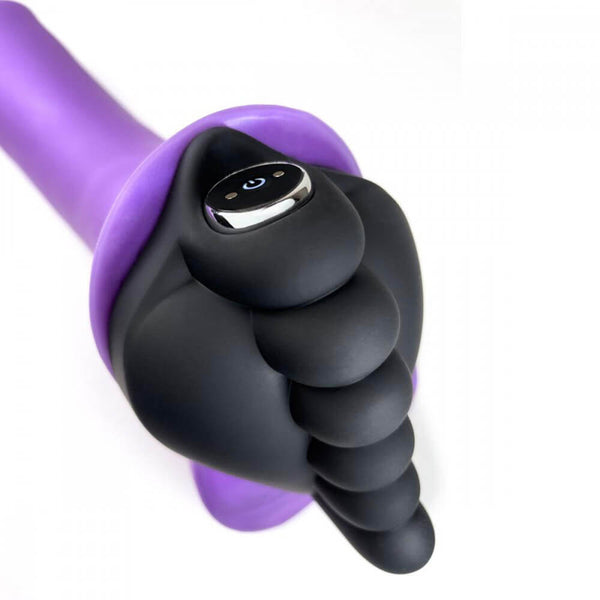 Close-up shot of the Honeybunch Dildo Base Attachment for Pegging Pleasure shows how it works with a dildo. The image shows that it doesn't wrap around the base - at all - unlike the BumpHer. This angle also shows how a bullet vibrator easily fits into the empty chamber of the dildo base cushion. | Kinkly Shop