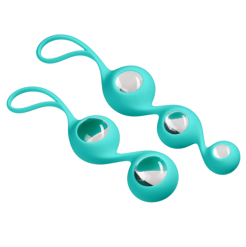 Both silicone sleeves shown full of kegel balls in this image. (Note: Only 3 Kegel balls are included with the Cloud 9 Borosilicate Kegel Training Set. The bonus two are shown for examples purposes.) | Kinkly Shop
