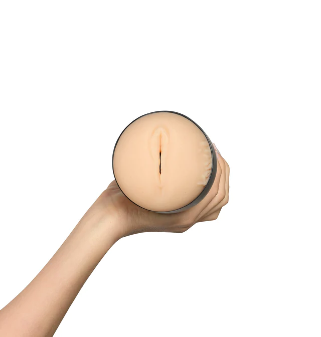 The orifice of the KIIROO FeelStars FeelKenzie Stroker faces the camera. The vulva of it has been directly modeled from Kenzie's body. | Kinkly Shop