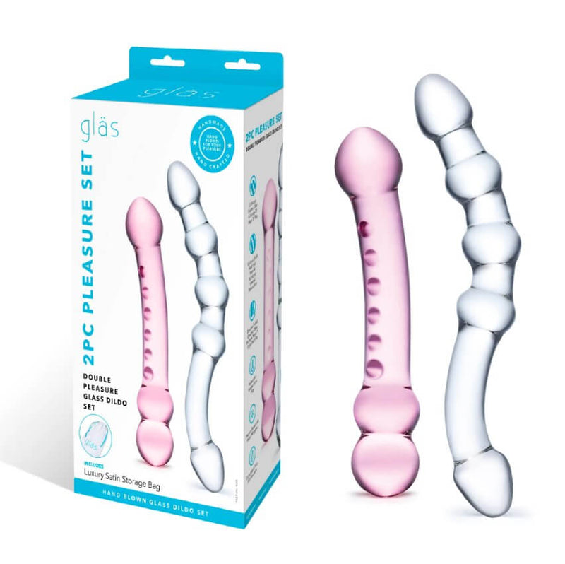 The two GLAS Double Pleasure Set dildos sitting out next to their packaging. The packaging is a rectangular cardboard box that would be easy for gifting. | Kinkly Shop