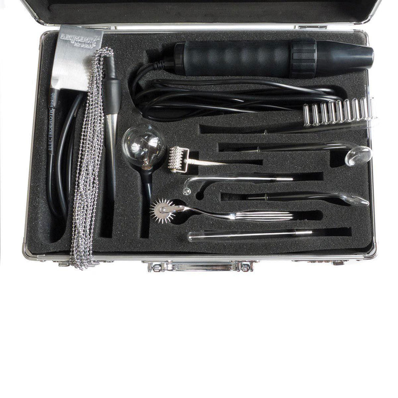 All of the items included within the KinkLab Agent Noir Electro Erotic Neon Wand Kit. They're all sitting within their made-for-them foam spot within the included attache case. This shows the protective foam included within the case as well as the large variety of items included in the kit. | Kinkly Shop