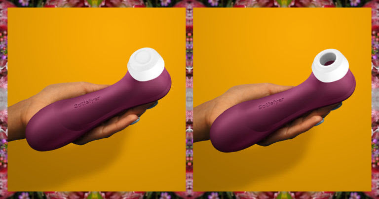 Two images of the Satisfyer Pro 2 - Generation 3 up against a yellow background. In both, a hand holds the vibrator, palm-flat. The vibrator is noticeably longer than the person's extended hand. In the first image, the Pro 2's cap is on to protect the hollow air suction hole while the second image shows the hollow hole open for use. | Kinkly Shop