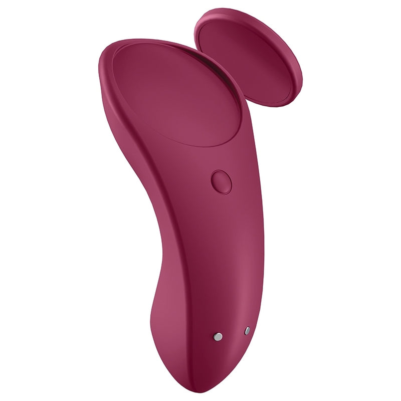 Image shows the magnet removed from the Satisfyer Sexy Secret panty vibrator to show how the vibe fits onto any pair of underwear or can be used as a swimsuit vibrator | Kinkly Shop