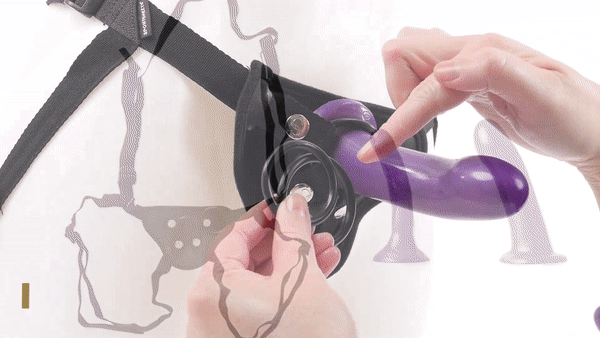 GIF shows a person unsnapping one of the O-ring snaps that hold the dildo in the Sportsheets Anal Explorer Kit. These snaps let you switch out the O-rings for other O-ring sizes. | Kinkly Shop