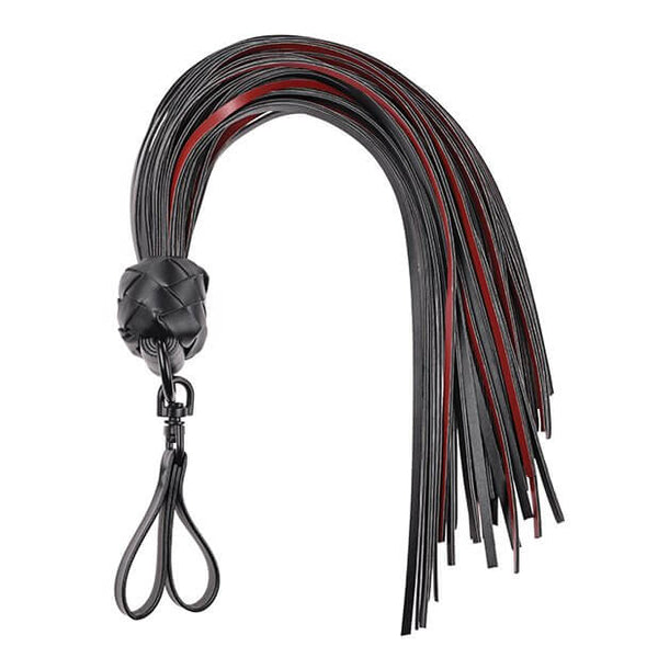 The Sportsheets Saffron Finger Flogger up against a white background. The flogger is laid out in a U-shape. This makes it fit easily into a square photo format while showcasing the two finger loops that function as a "handle" very clearly. | Kinkly Shop