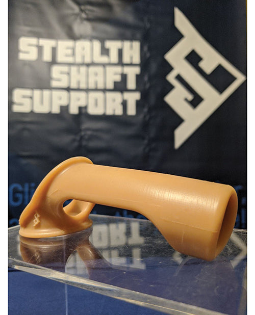One of the first prototypes of the Stealth Shaft Support sitting out at a exhibitor booth. | Kinkly Shop