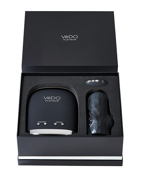 The VeDO Hummer 2.0 packaged into the packaging with the lid removed to show how it looks. This makes it clear that the packaging can be used for long term storage of the hands free male sex toy. Each one of the pieces sits inside of a foam cut-out made just for its shape. | Kinkly Shop
