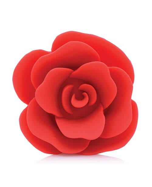 A close-up of the rose at the base of the plug. It has multiple "petals" made of silicone that extend outward from the center of the plug. | Kinkly Shop
