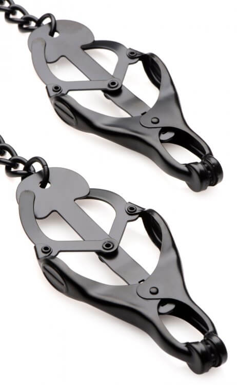 Close-up of the Master Series Monarch Noir nipple clamps helps show the mechanism that makes the nipple clamps tighter when pressure is applied to the connecting chain. | Kinkly Shop