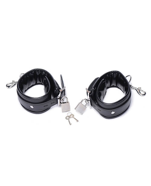 Showcasing the two Master Series Squat Impaler cuffs on a white background. It also shows the two silver locks and silver keys that are included with the cuffs. | Kinkly Shop