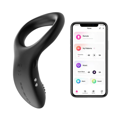 The Lovense Diamo Vibrating Cock Ring next to a cell phone opened to the Lovnese app to control the ring | Kinkly Shop