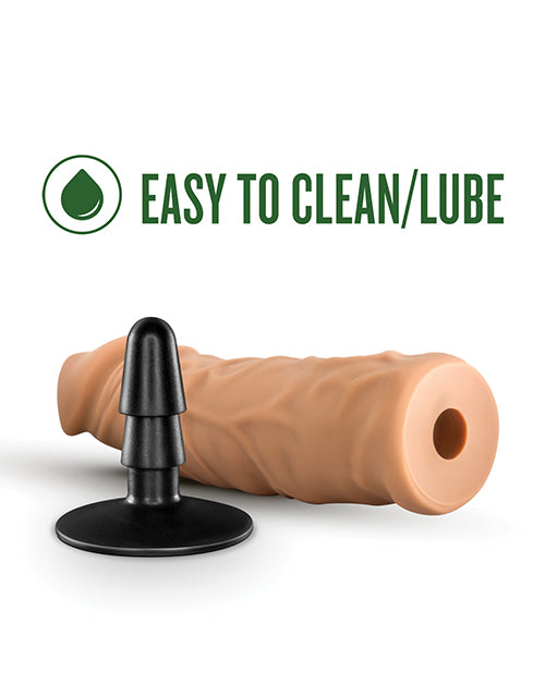 The Blush Lock On 8" Argonite shown with the Lock On metal base pulled out from the dildo. There's a hole in the base of the dildo where the dildo can be slid onto Lock On or Vac-u-Lock posts. Text on the image reads: "Easy to clean and lube" | Kinkly Shop