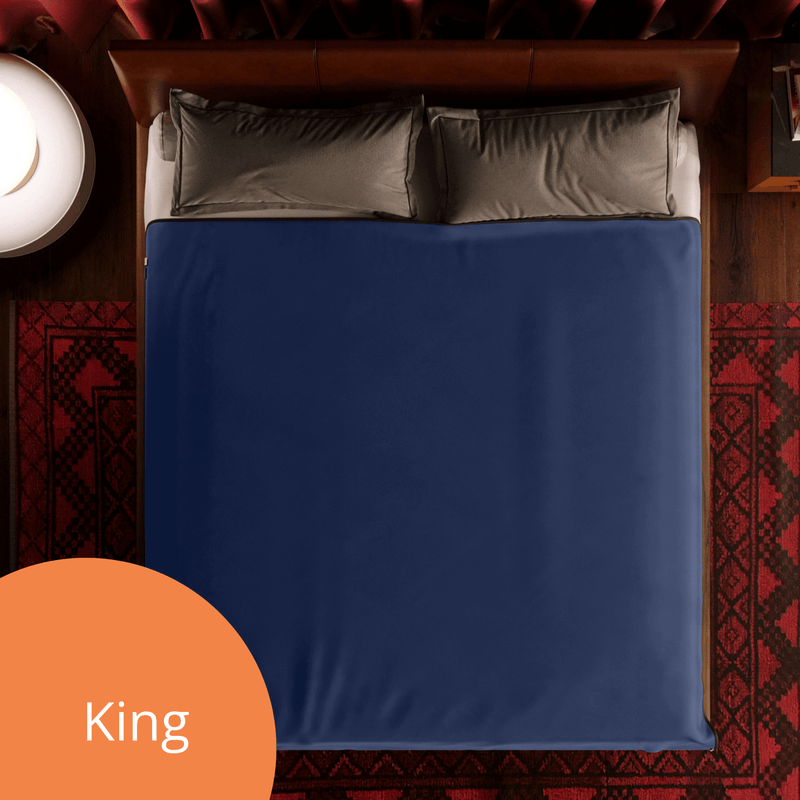 A top down view of a bed with the Liberator Fascinator Throw in King size on it. The blanket covers the entirety of a King-sized bed. The only space it doesn't cover is underneath the pillows on a King-sized bed. | Kinkly Shop
