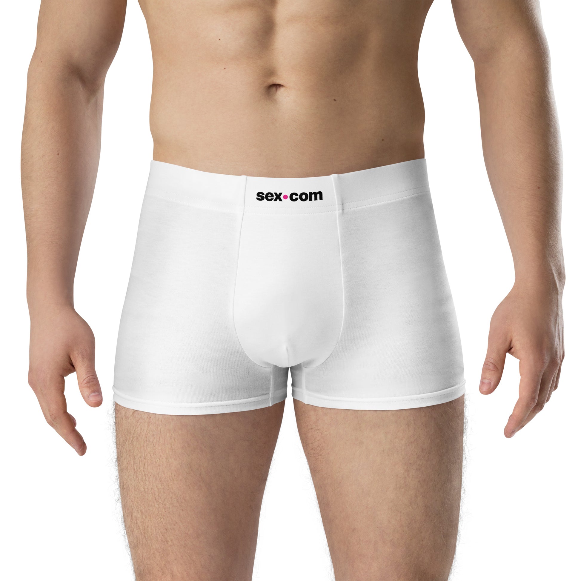 A person wears the Sex.com Boxer Shorts, facing the camera. | Kinkly Shop