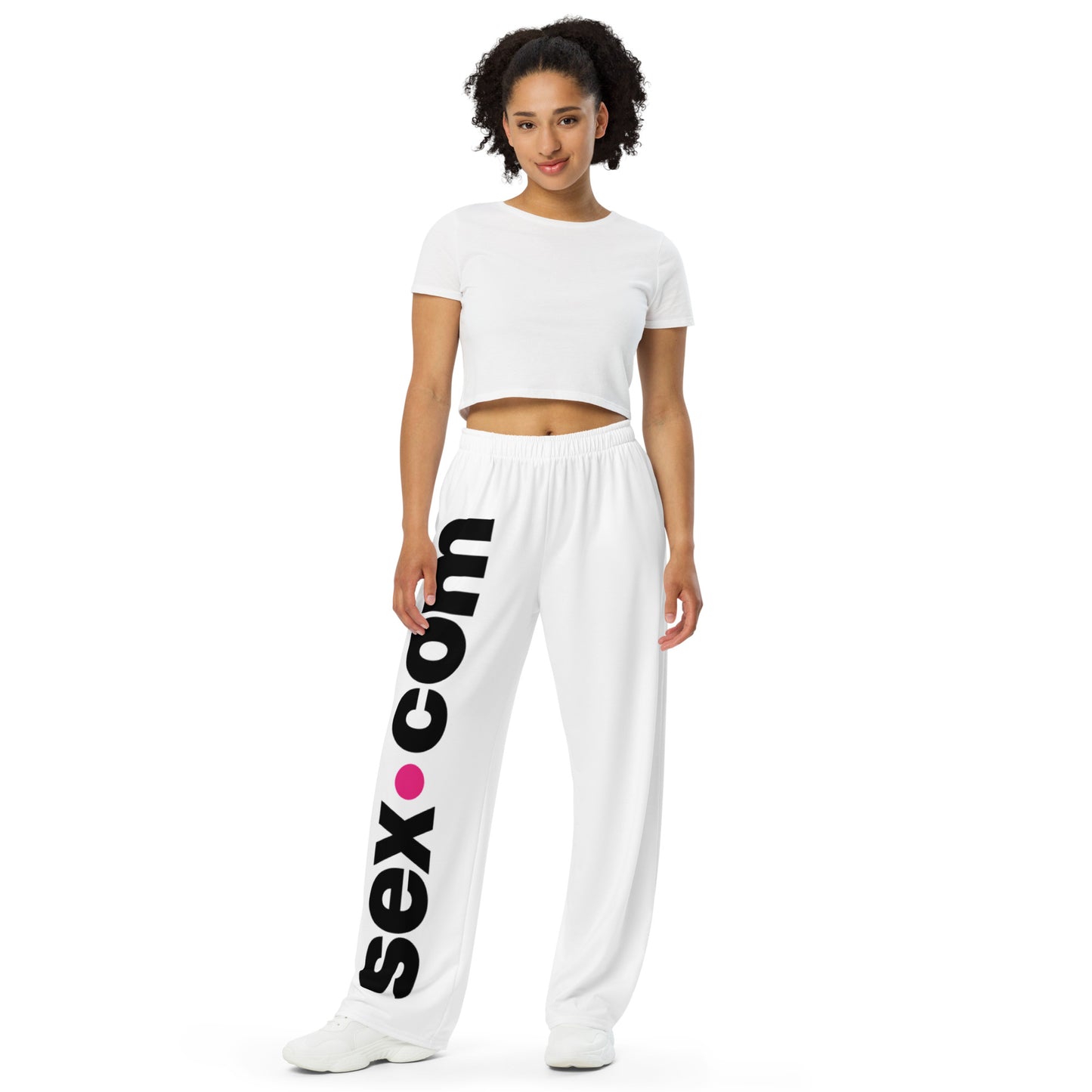 A person wears the Sex.com Unisex Pajamas Pants. They look very comfortable in the pants with a loose fit everywhere except the waist. | Kinkly Shop