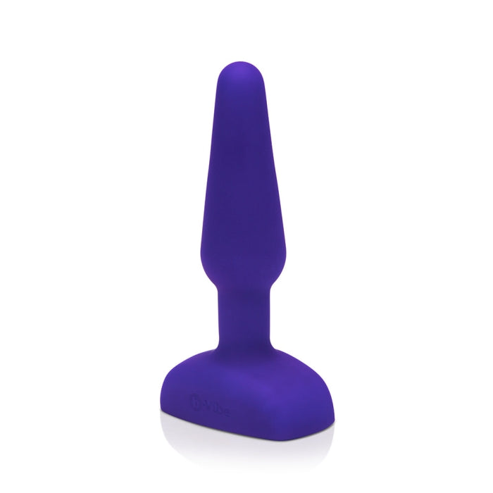 The b-Vibe Remote Trio Plug in purple in front of a white background | Kinkly Shop