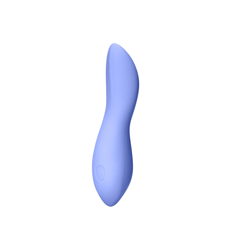 The Dame Dip vibrator in front of a white background. The entire toy looks smooth except a small divet near the base which functions as the toy's single button to control the vibrations. | Kinkly Shop