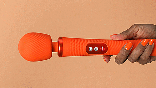 GIF of a person holding the Fun Factory VIM horizontally before holding it vertically. The text on the GIF reads "Vibration-Free Handle" | Kinkly Shop