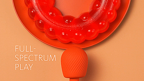 GIF of the Fun Factory VIM shows the vibrator impressively shaking a plate of Jello. The text on the GIF reads "Warm-up to Orgasm, Full Spectrum Play" | Kinkly Shop