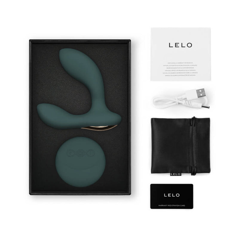 The LELO HUGO 2 shown with everything it comes with. It has an instruction manual, the toy storage bag, the charging cable, and warranty information. | Kinkly Shop
