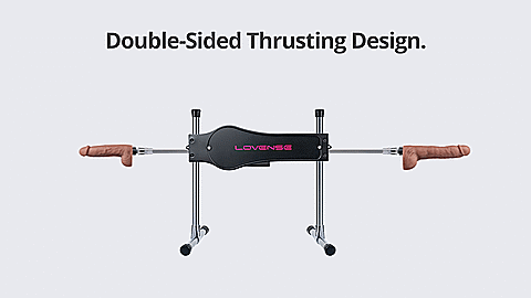 GIF of the Lovense Sex Machine thrusting two dildos. A dildo is connected to both sides of the sex machine, and they are thrusting back and forth. The text on the GIF reads "Double-sided thrusting design" | Kinkly Shop