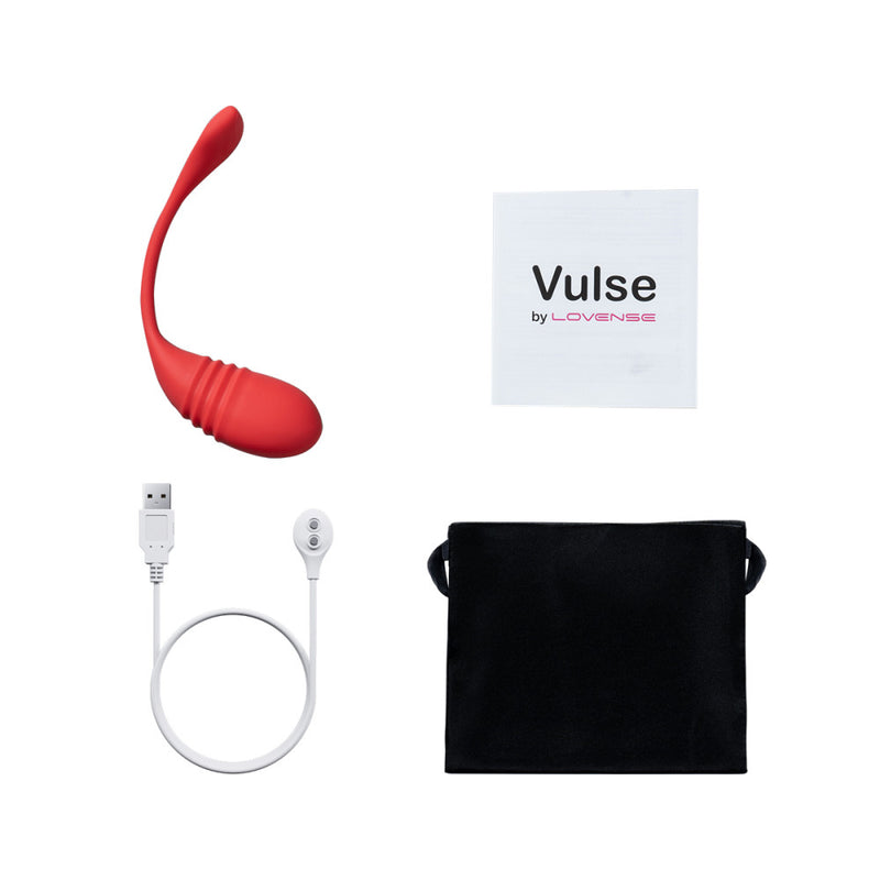 The Lovense Vulse on a white background, shown with everything that comes with the Vulse. It has the vibrator itself, an instruction booklet, the charging cable, and a drawstring storage bag. | Kinkly Shop