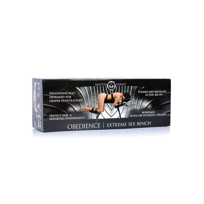 Packaging for the Master Series Obedience Extreme Sex Bench. It comes in a wide, long box that is not-at-all discreet. It will ship inside a shipment box which will be much more discreet than this brick and mortar box designed to capture attention in-store. | Kinkly Shop