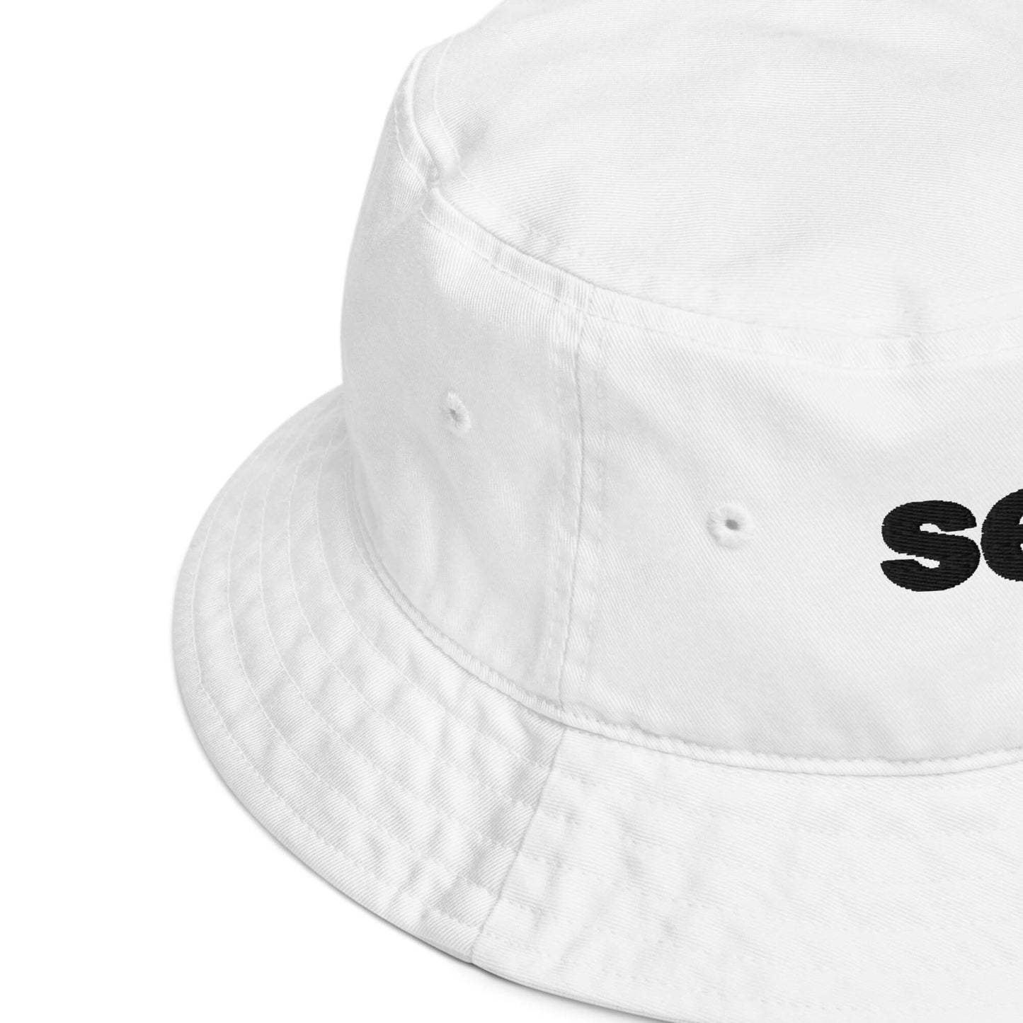 Close-up of the texture of the cloth fabric on the Sex.com Organic Bucket Hat | Kinkly Shop