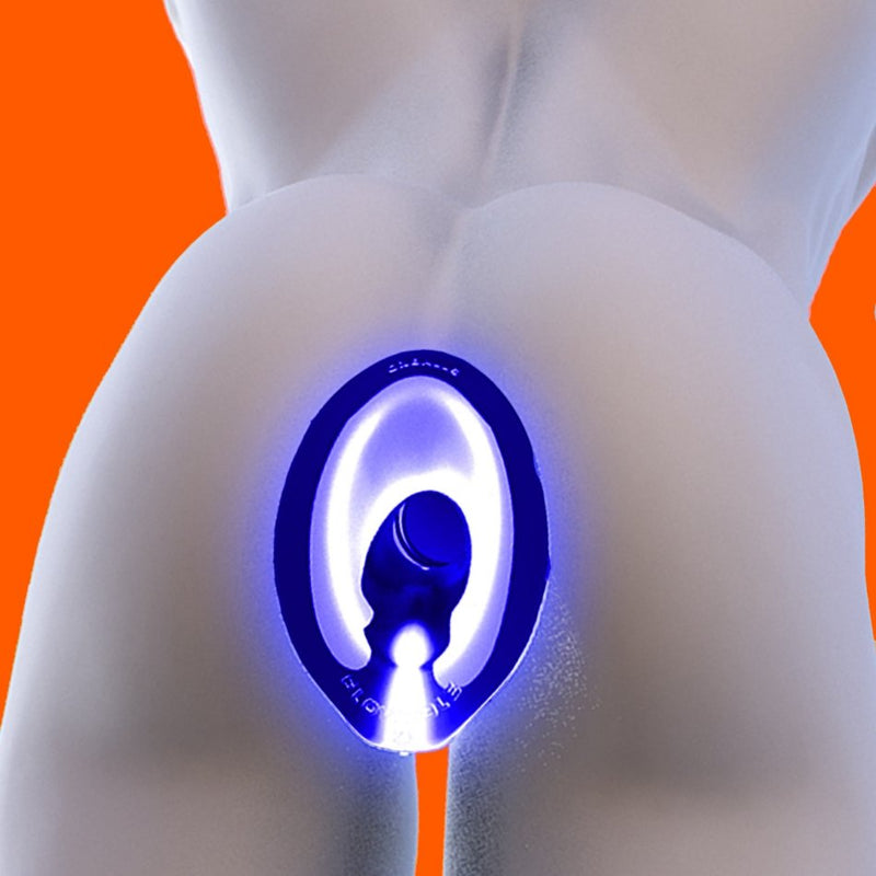 The Oxballs Glowhole inserted into an illustrated butt, shown glowing because the anal plug is turned on. It illuminates the inside of the body as well as the outside of the body while holding the butt open. | Kinkly Shop