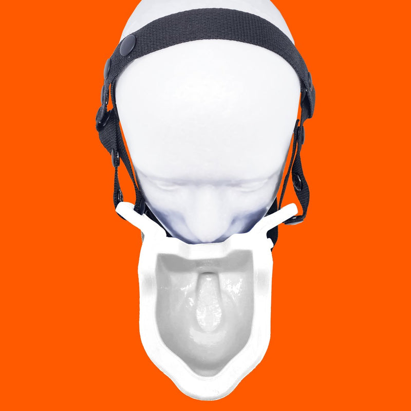 Top-down view of a mannequin head wearing the Oxballs Watersports Gag. The gag offers a very large trough for liquid to go in with a tube that goes inside of the mouth. | Kinkly Shop