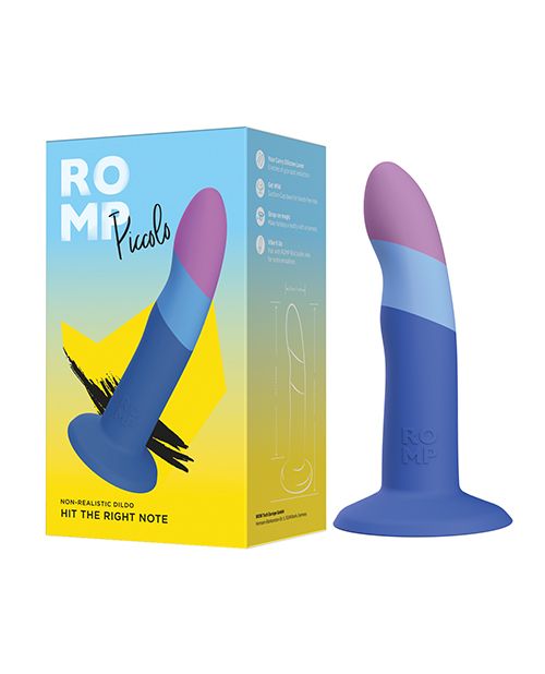 The ROMP Piccolo dildo sitting out next to the packaging that it comes in. | Kinkly Shop