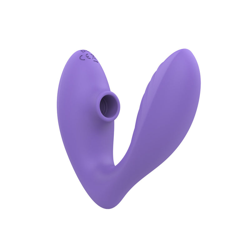 A close-up of the air suction tip of the clitoral stimulator. It is clearly built directly into the vibe, and it can not be removed. It is hollow on the inside, and it is protruding noticeably from the toy itself. | Kinkly Shop