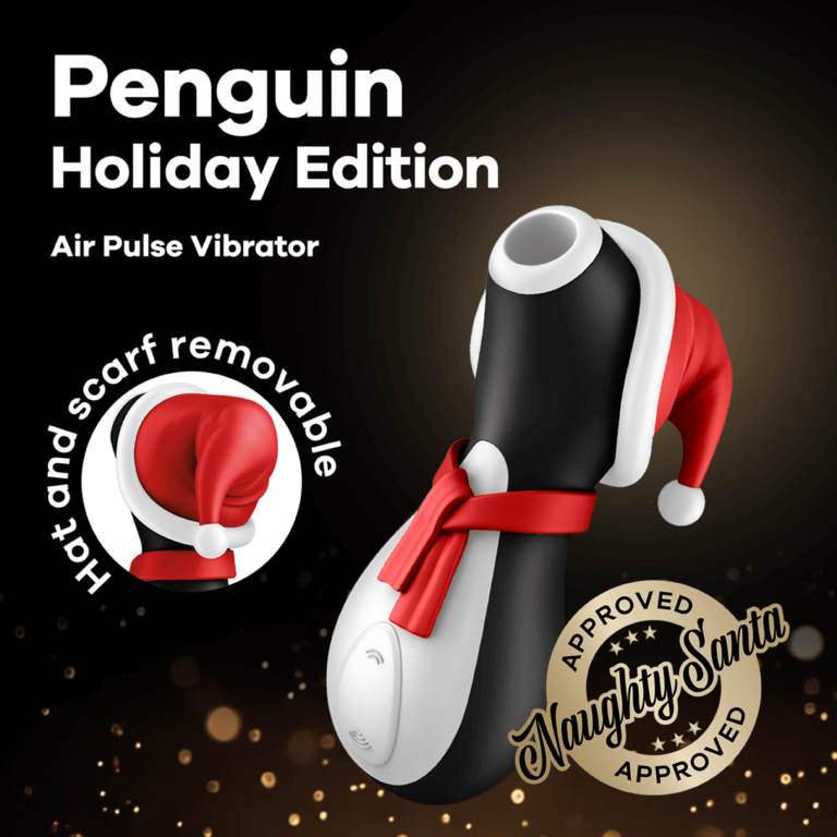 Satifyer Pro Penguin Holiday Edition marketing image. The Satifyer Pro Penguin Holiday Edition is in front of a black background with golden sparkles. There's a cut-out image that showcases the backside of the cute hat. Text on the image reads: "Penguin Holiday Edition. Air Pulse Vibrator. Hat and Scarf Removable. Naughty Santa Approved" | Kinkly Shop